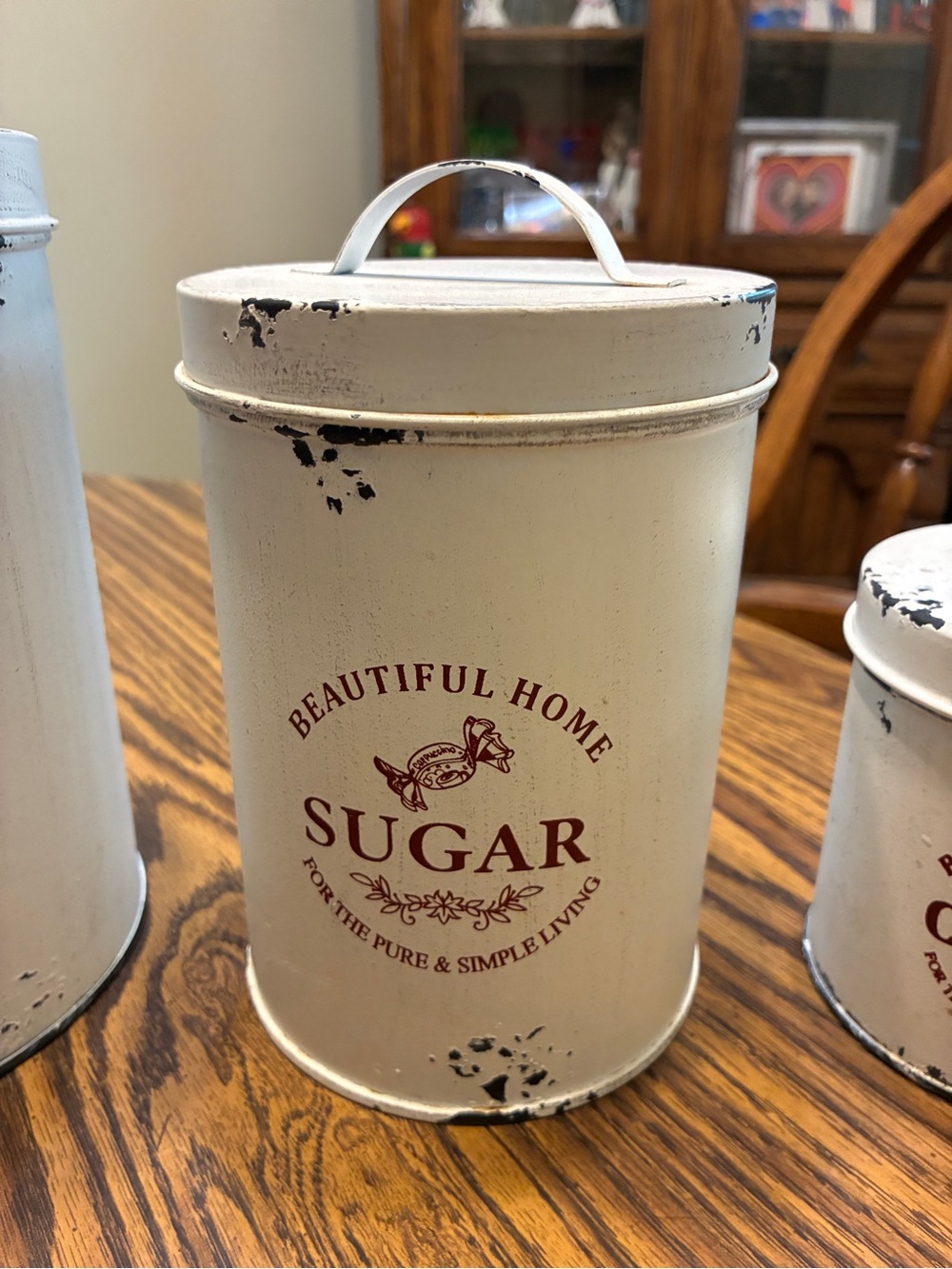 white metal canister set features a distressed farmhouse design "Beautiful Home - Picture 3 of 7